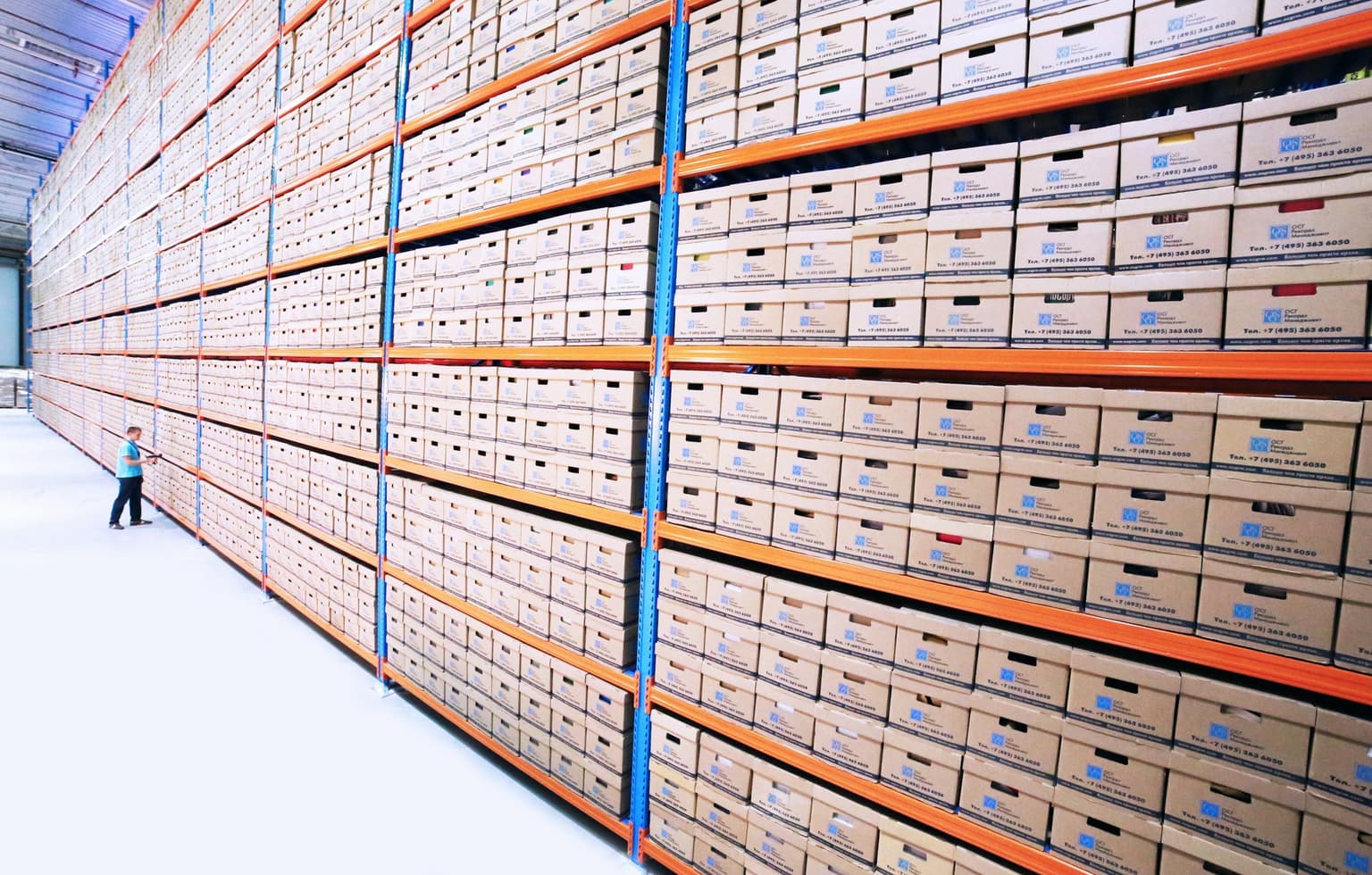 Wall of archived record boxes